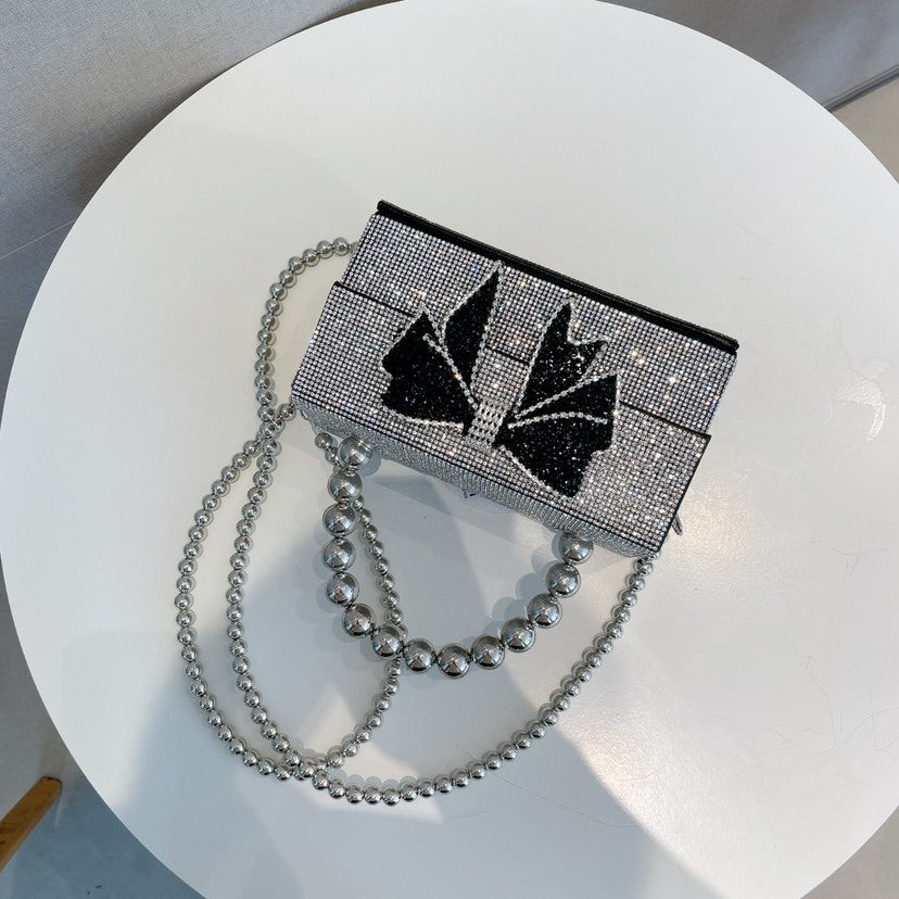 Celia Pearl Chain Bow Crossbody Bag